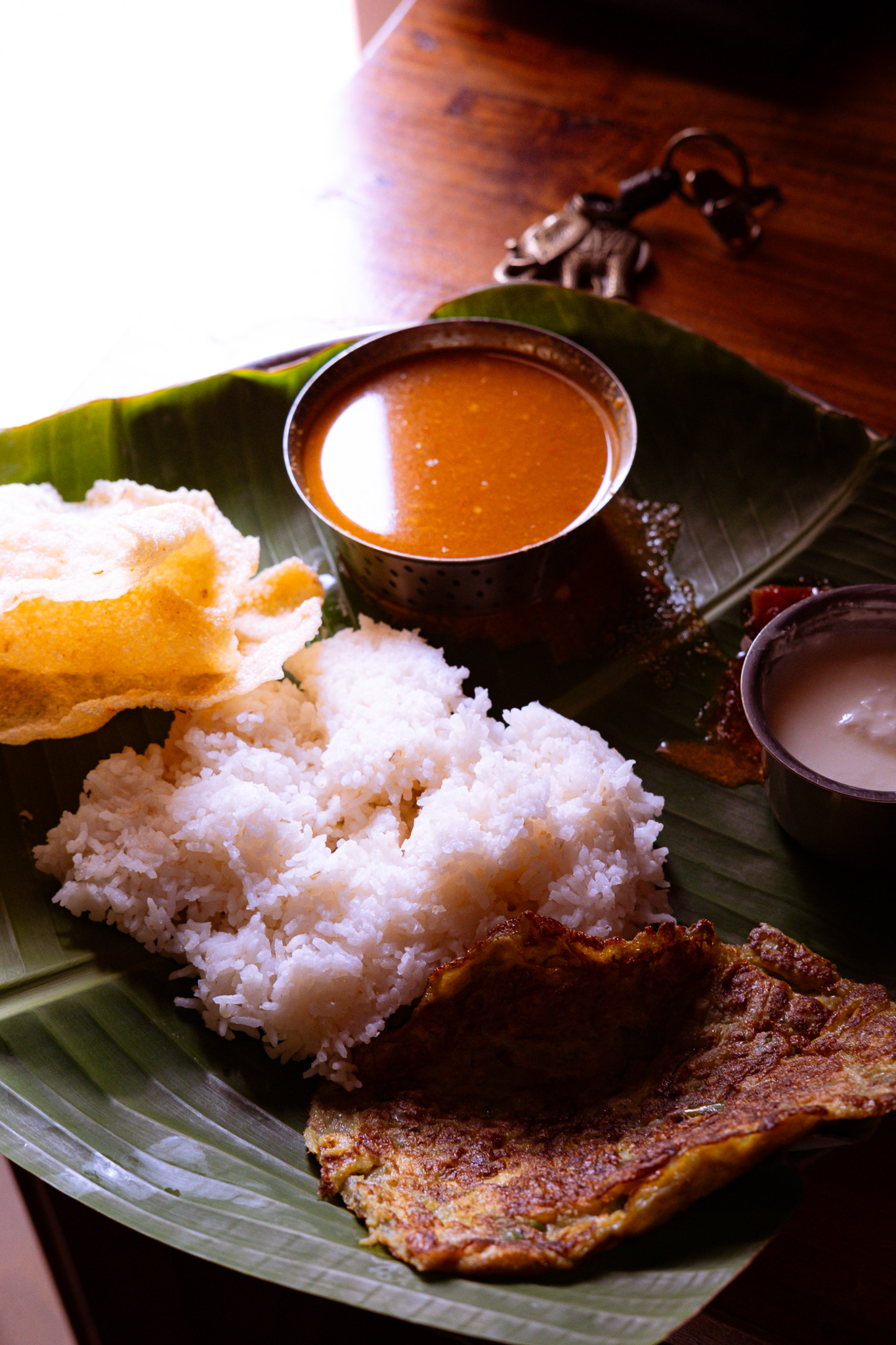 A meal served on a banana leaf from the farmhouse kitchen